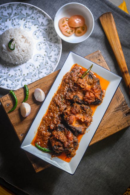 Traditional Masor Tenga dish from Assam, India — Authentic recipe from Eat By State
