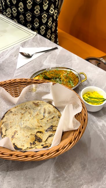 Traditional Sarson da Saag with Makki di Roti dish from Punjab, India — Authentic recipe from Eat By State